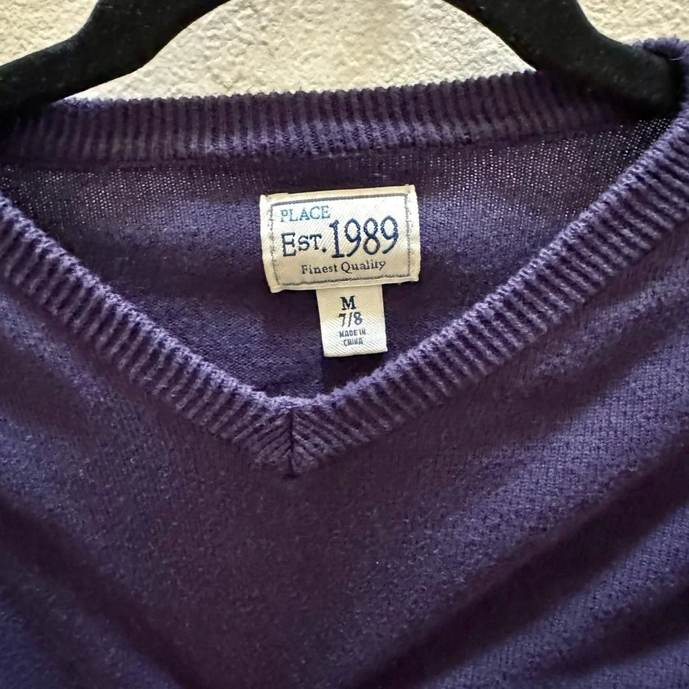 Gently used boys sweater. Blue v neck sweater. Boys size 7/8.